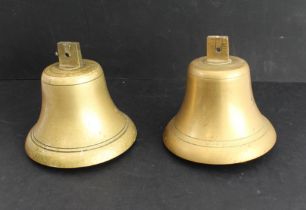 A similar pair of 19th century bells (possibly ships) each with original clapper (17.5cm diameter)