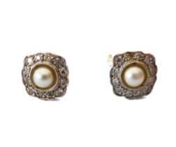 A pair of 14ct white gold, cultured pearl and diamond cluster earrings - the single half-pearls