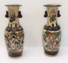 A pair of late 19th to early 20th century Chinese crackleware vases: the slightly waisted neck