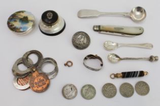 A collection of bijouterie to include an enamel silver pill box, an agate pencil, a cloisonné pen