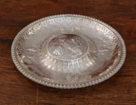 A 19th century heavy hallmarked silver rosewater dish: the central raised circle decorated