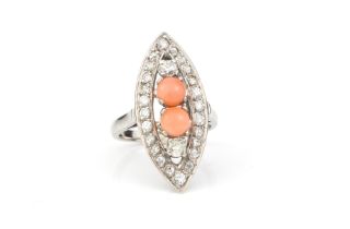 An 18ct white gold, coral and diamond marquise cluster ring