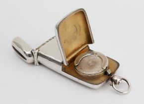 An unusual hallmarked silver sovereign-holder/vesta case: two hinged lids, the vesta case lid with