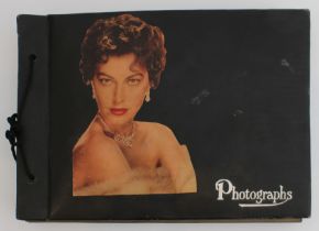 A 1950s album of 82 mostly auto-signed postcard photographs of screen, theatre, music and radio