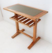 Thomas Hudson (the 'Cowman') of Odell, Bedfordshire - a maple office table: inset green leather