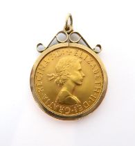 A 1968 Elizabeth II gold sovereign - in a 9ct gold pendant mount, total weight 9.4g.