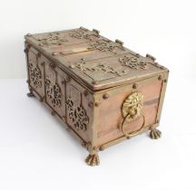 A brass-mounted copper tabletop Armada chest in 17th century German style and of typical strongbox