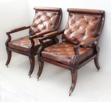 A fine pair of mahogany and leather open library armchairs in late Regency style (late 20th century)