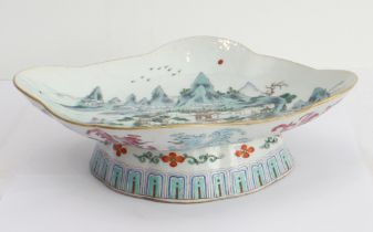 A 19th century Chinese lozenge-shaped porcelain pedestal dish. The interior delicately decorated