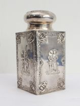 A late 19th century Dutch silver tea caddy: the circular push-on lid engraved with monogram within a