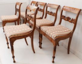 A set of six early 19th century Biedermeier-style maple dining chairs: each with tablet-shaped