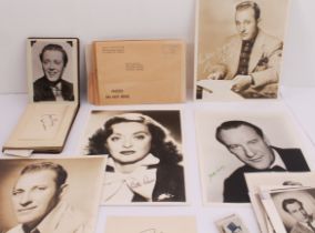 A 1950s autograph book and 27 loose similar period auto-signed photo-postcards (mostly 14 x 9 cm) of