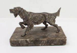 An early 20th century cast-metal model of a German longhaired pointer: the underside marked Germany;