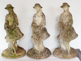 A set of three garden composite stone figures of flower girls - attractively weathered, 54cm. high.