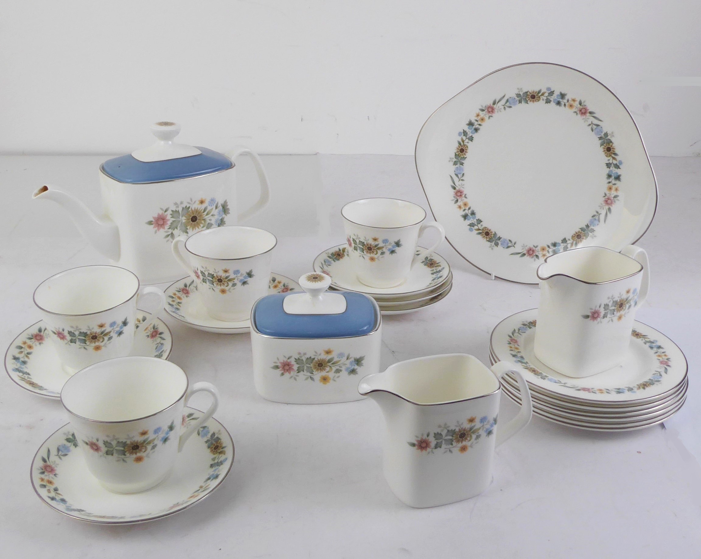 A Royal Doulton Pastorale pattern part tea service - ref. H5002, comprising a teapot; covered