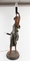 An impressive French bronzed spelter figural lamp - 20th century, the Art Nouveau style figure of