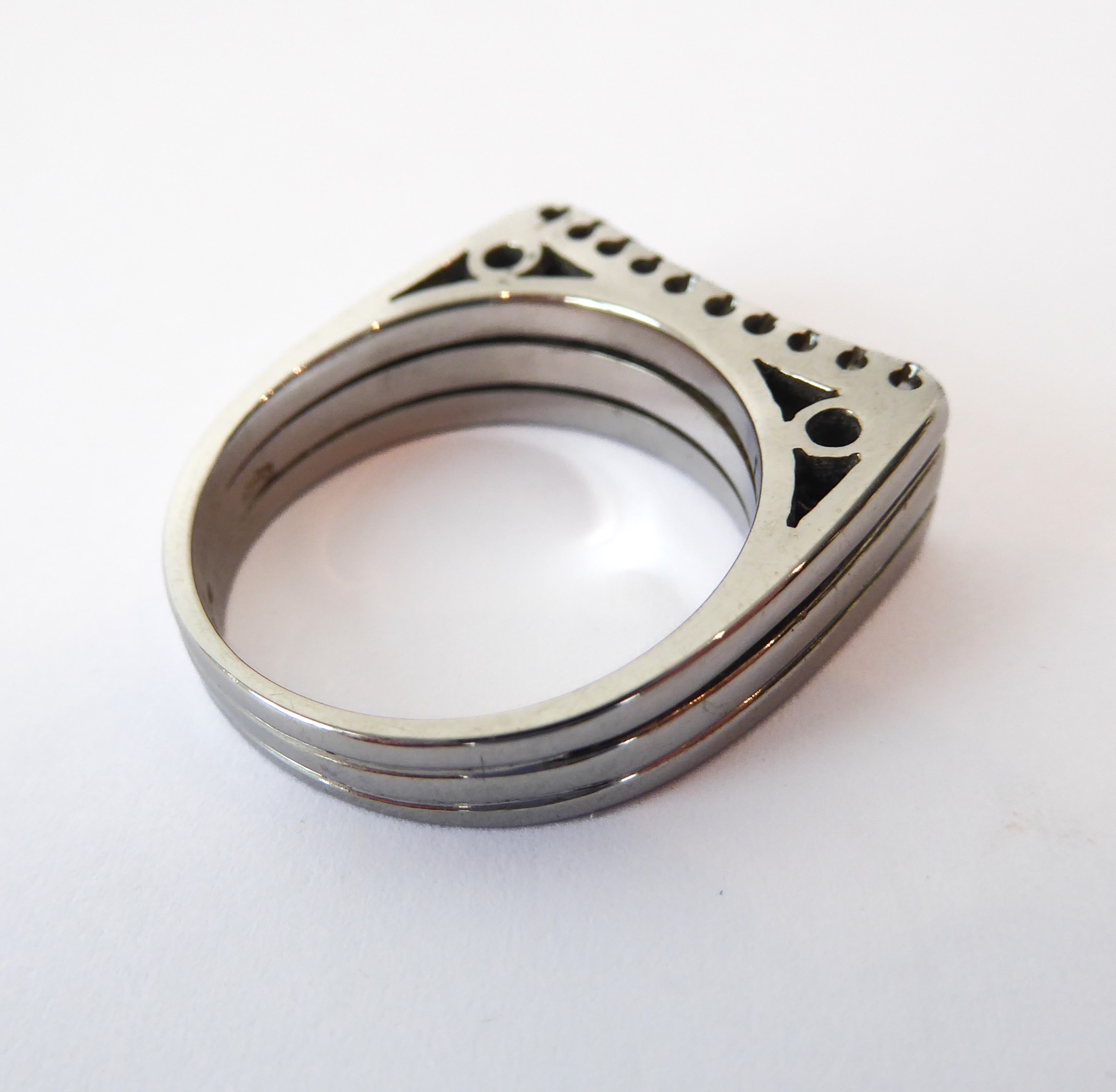 An 18ct white gold and diamond three row ring - marked '750', the slightly concave top set with - Image 4 of 4