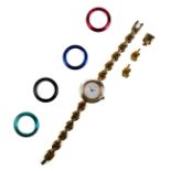 A ladies Gucci gold plated bracelet watch with interchangeable bezels - quartz movement, plain white