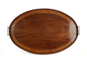 A large Edwardian, inlaid and cross-banded, oval mahogany tray with brass handles, 68 cm long.