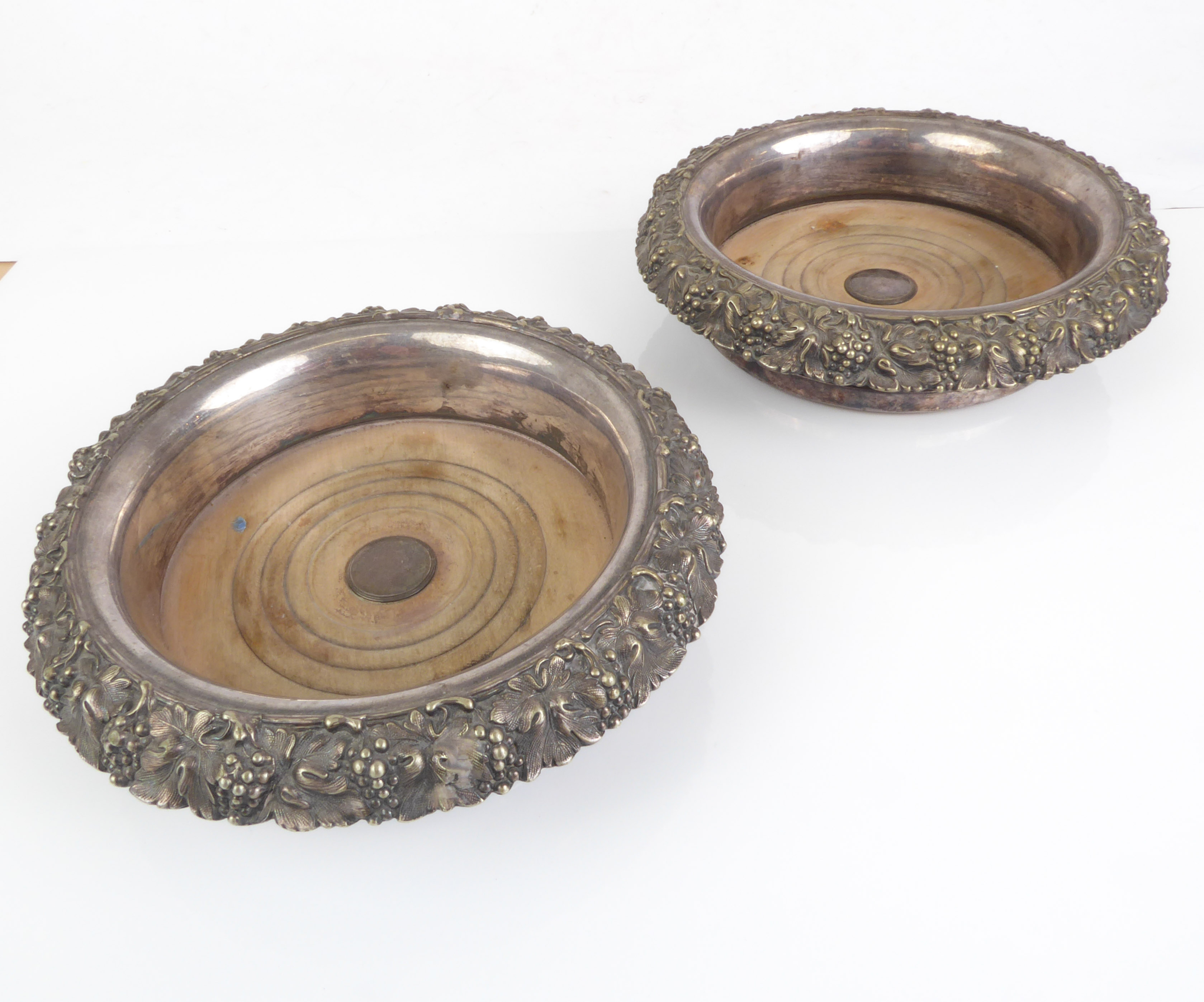 A large and heavy pair of 19th century silver-plated wine bottle coasters: faded turned wooden - Image 2 of 4