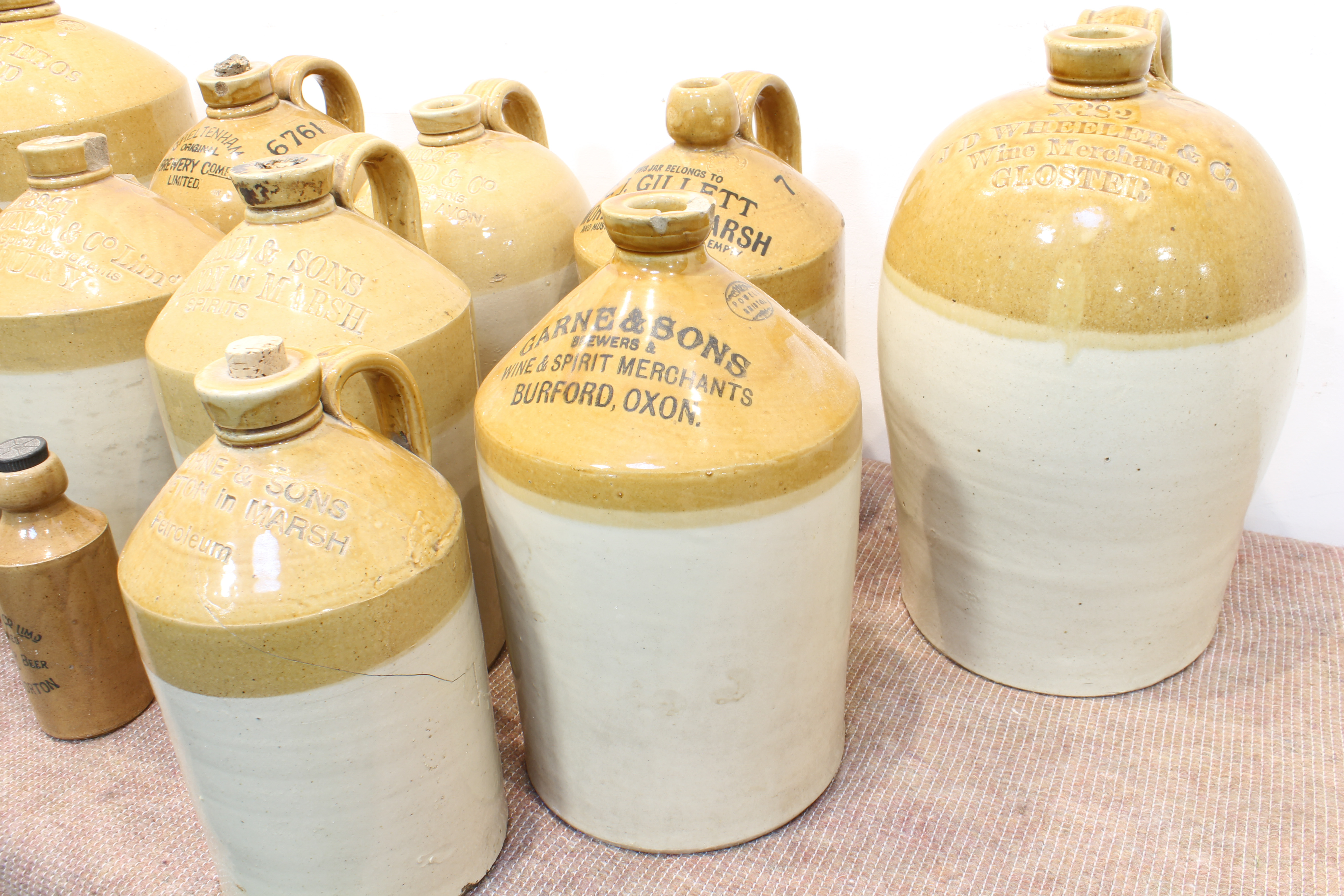 Fourteen late 19th and early 20th century jars and flagons (some with damage) to include: 'Dobell - Image 4 of 26