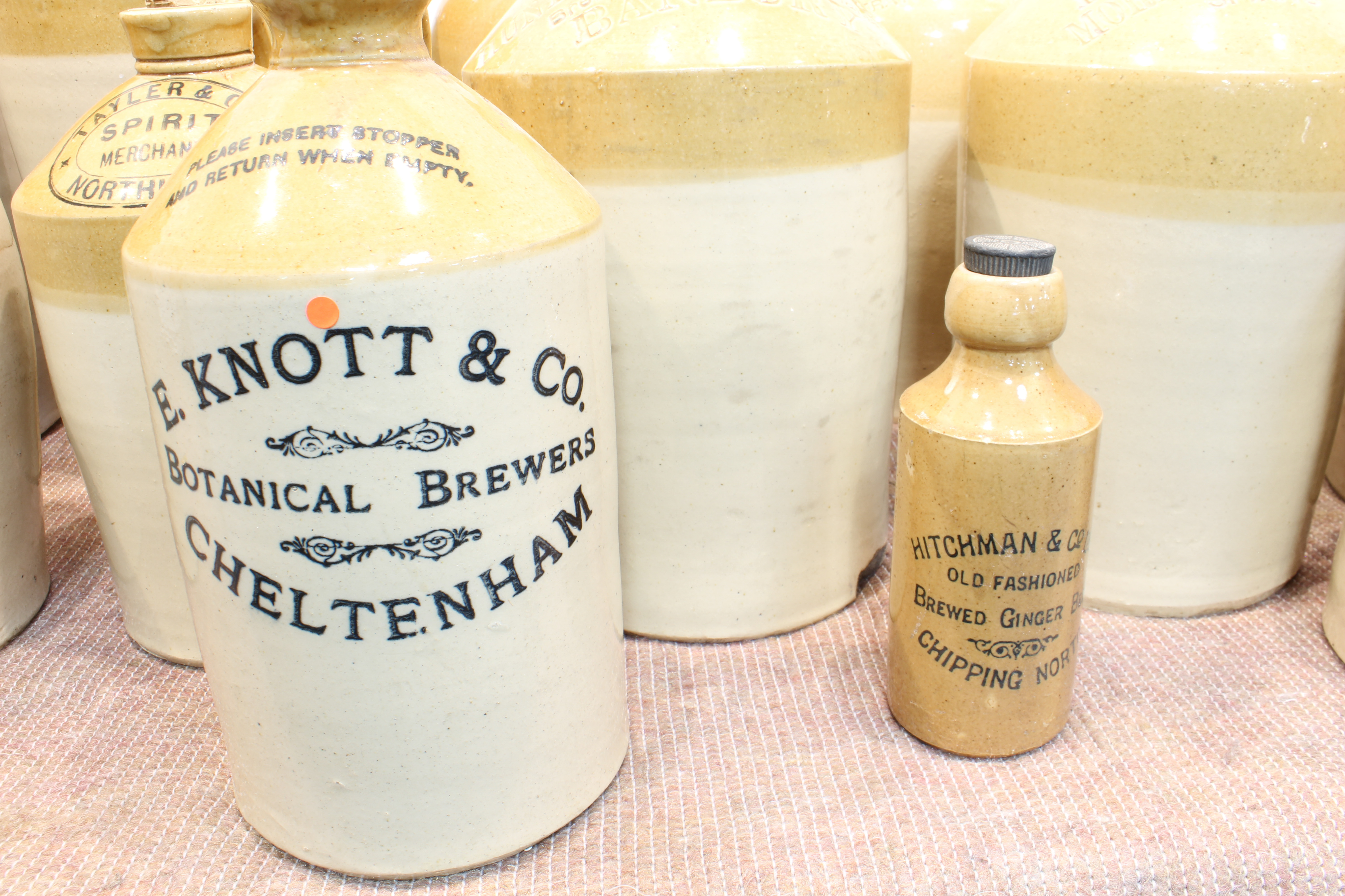 Fourteen late 19th and early 20th century jars and flagons (some with damage) to include: 'Dobell - Image 5 of 26