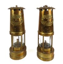 A pair of brass mounted miner's lamps by E Thomas & Williams Ltd Makers Aberdare, Wales: