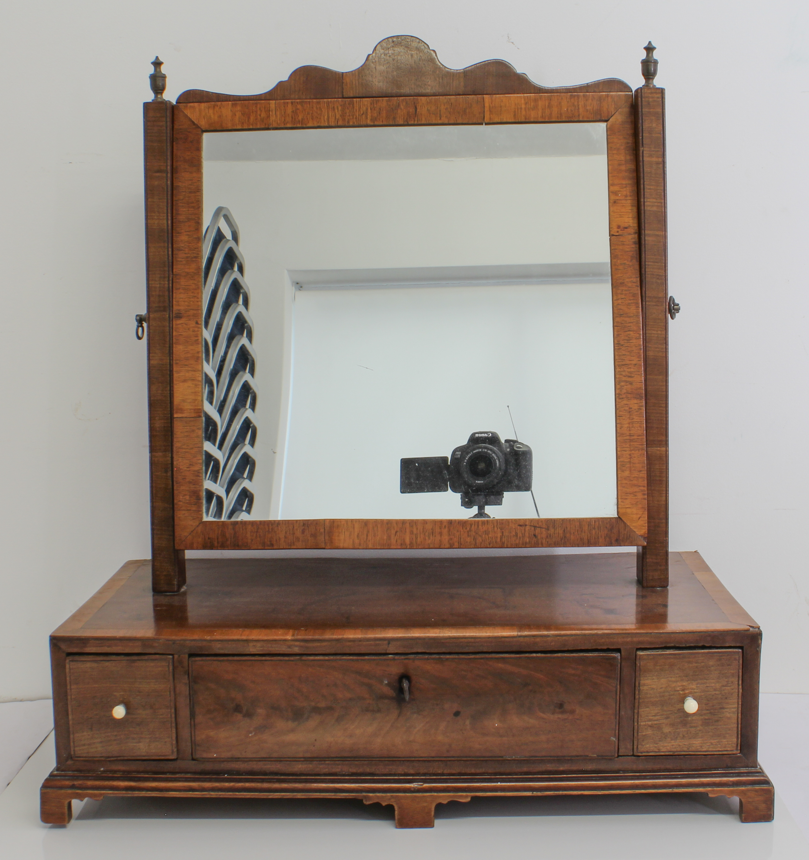 A George II period mahogany swing mirror: shaped top above the plate flanked by square taping - Image 2 of 2