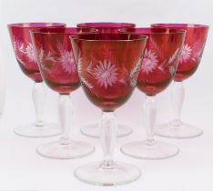A set of six red overlay wine glasses