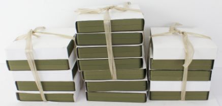 Seventeen jewellery presentation / display boxes - for necklaces, in bronze-green with off-white