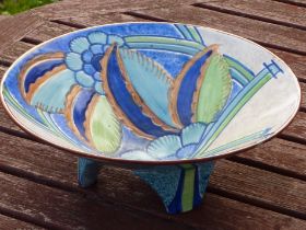 An Art Deco style ceramic bowl: incised polychrome decorated flowers and leaves decoration and