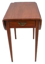 A small mahogany reproduction Pembroke table in early 19th century style: two drop leaves flanking a