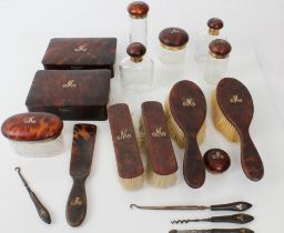 A lady's early 20th century tortoiseshell dressing table/vanity set to include: a pair of