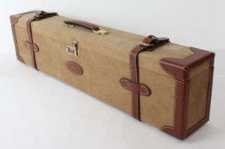 A Guardian canvas and leather double gun case (LWH 83 x 13 x 21.5 cm)