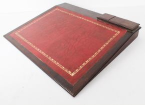 A late 19th century mahogany table or desk top writing slope - with later inset red gilt tooled