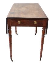 An early 19th century mahogany Pembroke table - single deep compartmentalised frieze drawer and