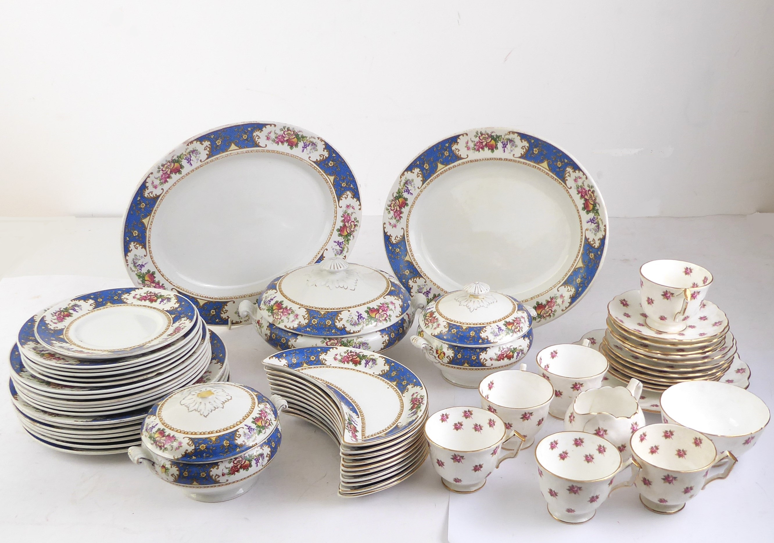 An Aynsley bone china part-tea service decorated with pink roses - green printed factory marks,