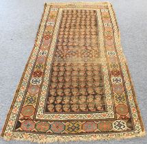 An antique early 20th century hand-knotted Khotan-style rug (Eastern Turkestan): stylised