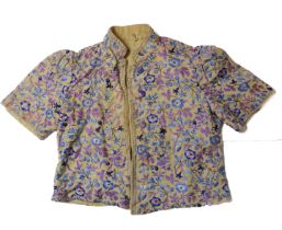 A vintage Chinese embroidered silk child's jacket - early 20th century, with short sleeves and