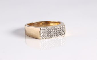 A 9ct yellow gold and diamond modernist style ring - hallmarked Birmingham 2007, the rectangular