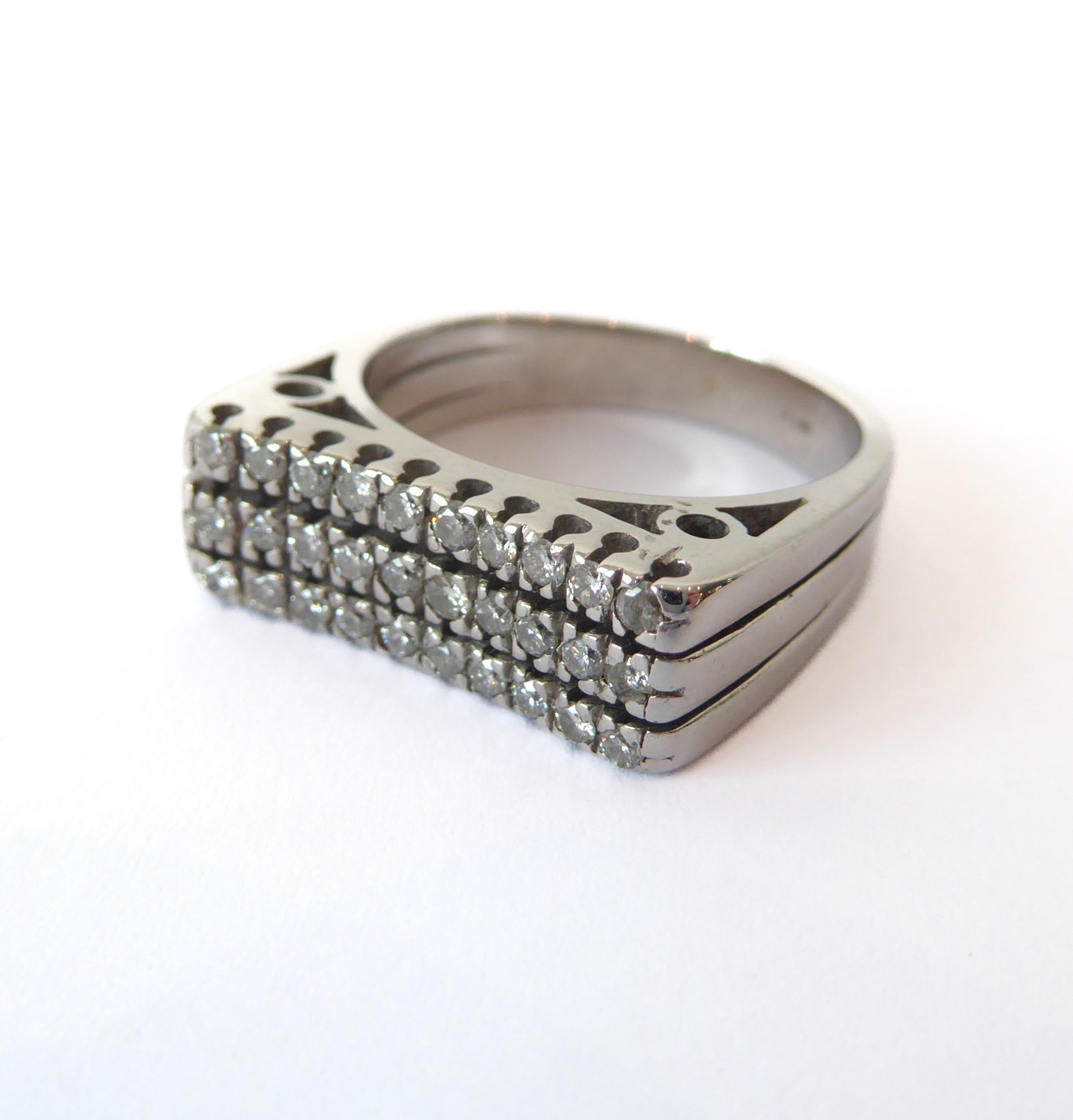 An 18ct white gold and diamond three row ring - marked '750', the slightly concave top set with - Image 3 of 4