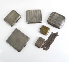 Four silver cigarette cases - with engine-turned and chased decoration, early to mid-20th century;
