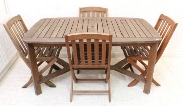 A hardwood garden table and a set of four folding chairs (LWH 149.5 x 90 x 72.5 cm) (One chair