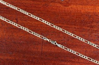 A 9ct yellow gold curb link necklace - stamped '9KT' to clasp, 50.5cm. long. weight 8.8g.