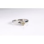 An 18ct white gold and diamond single stone ring - hallmarked Sheffield 2002, the brilliant cut