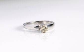 An 18ct white gold and diamond single stone ring - hallmarked Sheffield 2002, the brilliant cut
