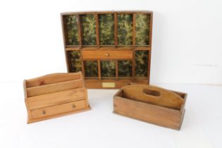 Three pieces: 1. an oak wall hanging display shelf with ten compartments lined with marbled paper