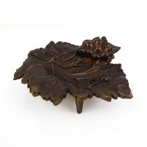 A Victorian-style novelty bronze inkwell - 20th century, in the form of a vine leaf, the inkwell