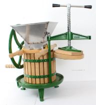 A domestic 12-litre apple or fruit crusher and cider press by Vigo Limited of Devon - with green