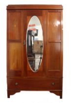 An Edwardian mahogany and marquetry wardrobe - shallow caddy top over a central door with bevelled